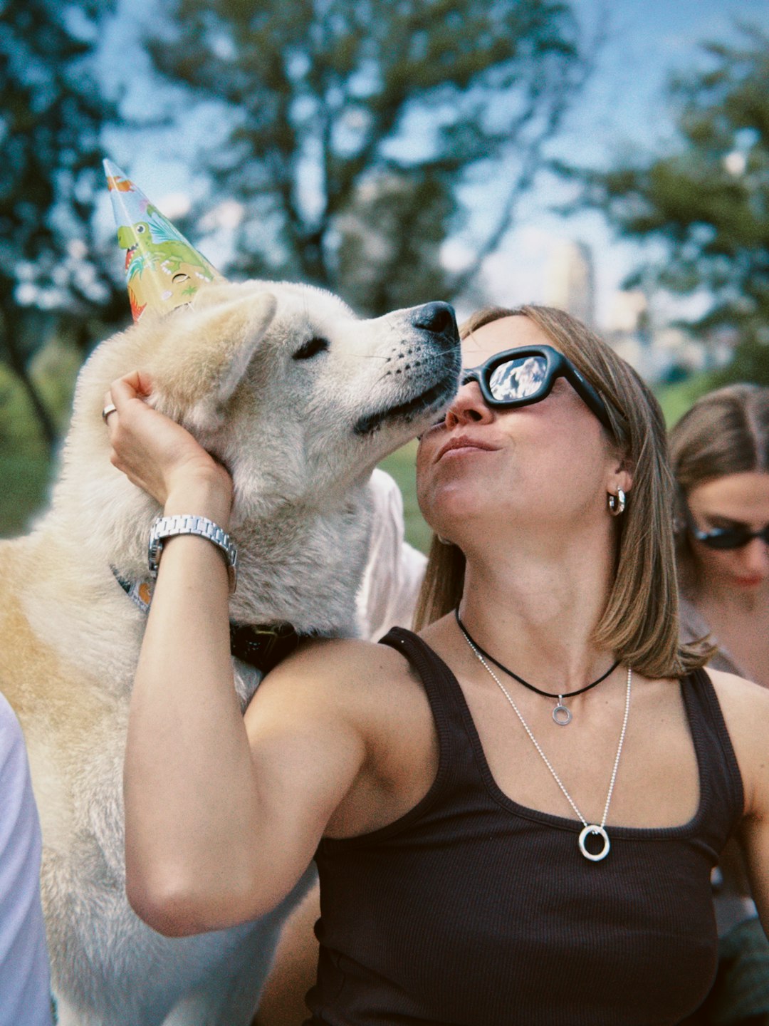 Families and dogs enjoying an outdoor festival